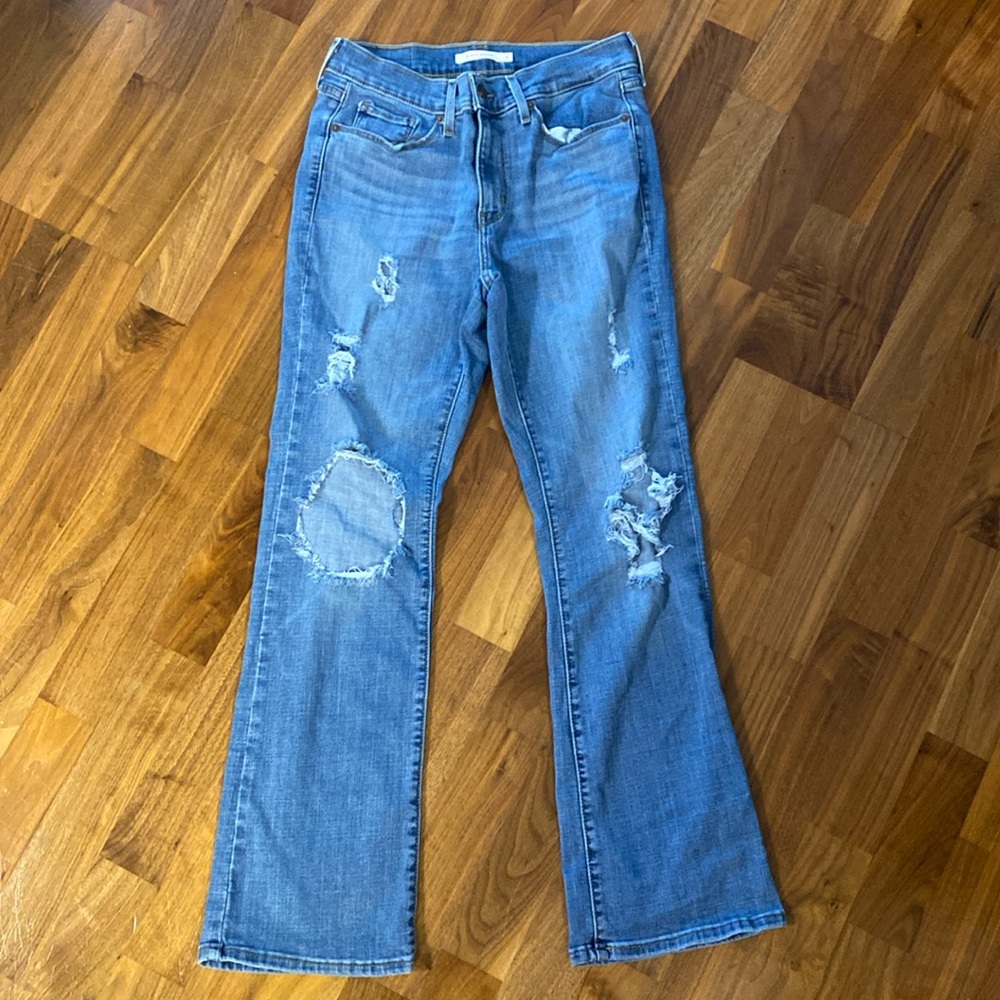 Levi classic boot five pocket, distressed size 4 blue jeans